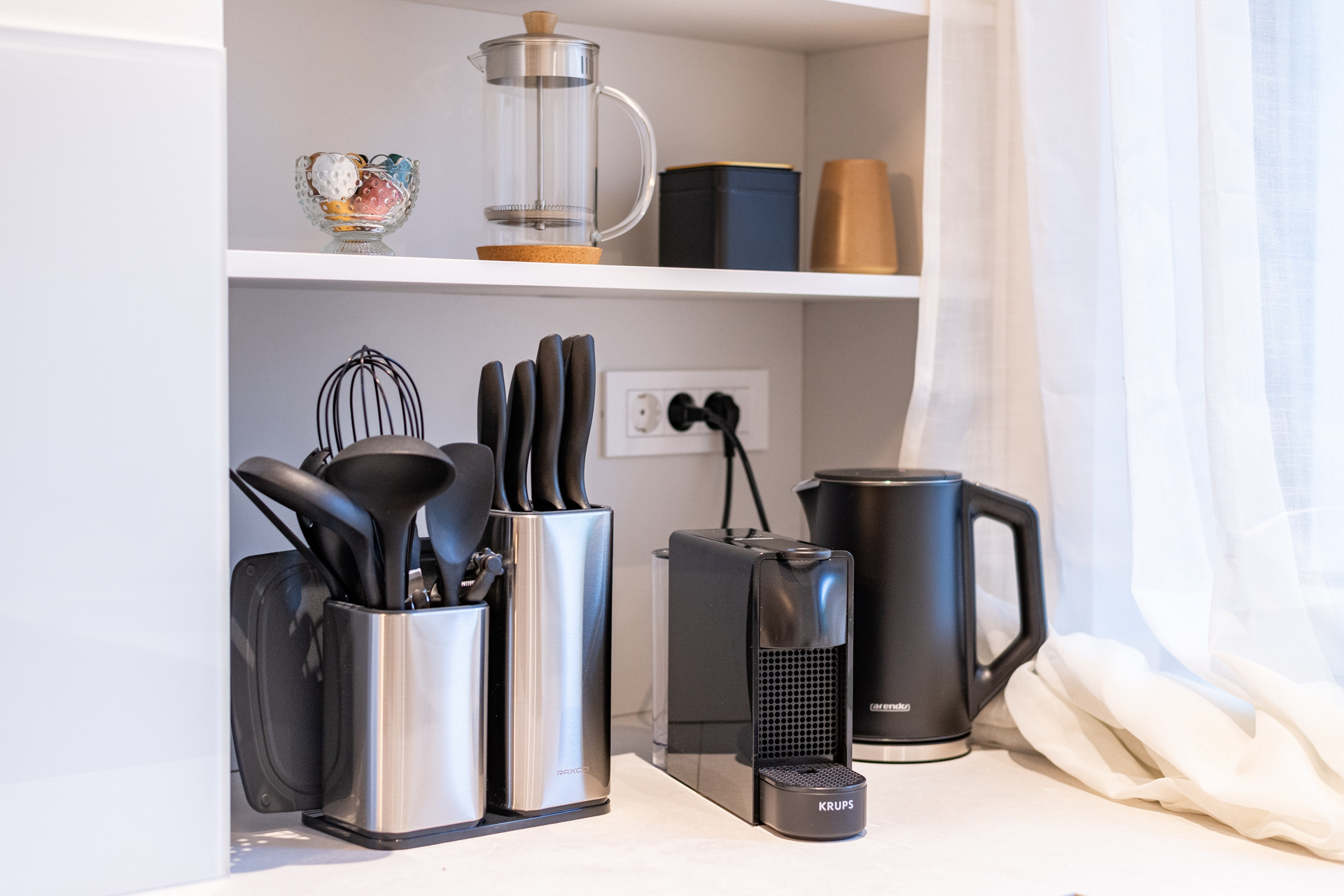 Kitchen amenities and appliances in The Ground Floor apartment